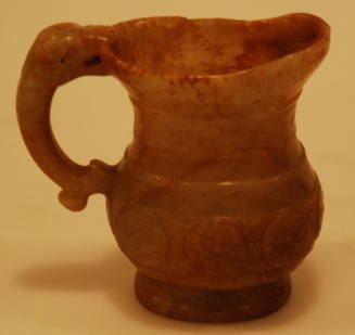 Small pitcher with dragon form handle