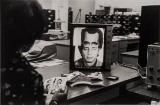 In the police headquarters photo identification sector. The machine makes a composite photo from various human head characteristics