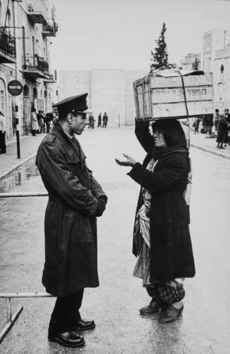 What Was Once the Mandelbaum Gate, a Jewish Israeli Man Talks with Christian Arab Israeli Woman, Jersusalem, Israel