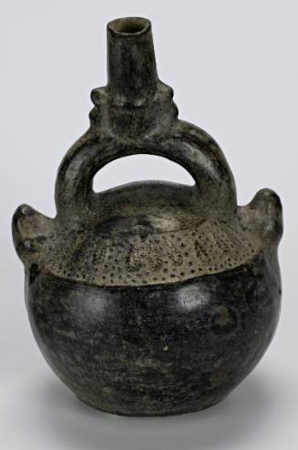 Stirrup-spout vessel with modeled vegetal forms and stippling