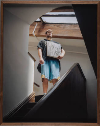 Man Descending Staircase with Painting