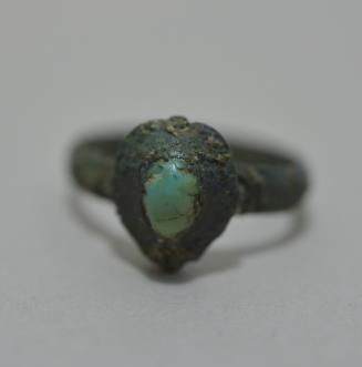 Ring with oval bezel set turquoise stone