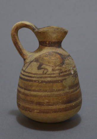 Pitcher with trefoil mouth with two confronted birds on the shoulder