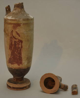 Attic white Lekythos; ornamented with scene at grave stele