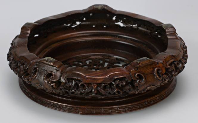 Carved stand for brush jar
