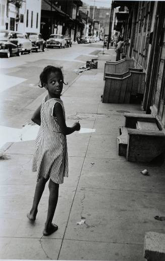 Little girl on street, New Orleans