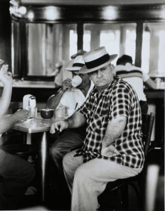 Man in Donut Shop, New Orleans