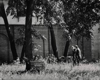 Harry Hopkins walking in US Embassy garden with US Amabassador Steinhardt