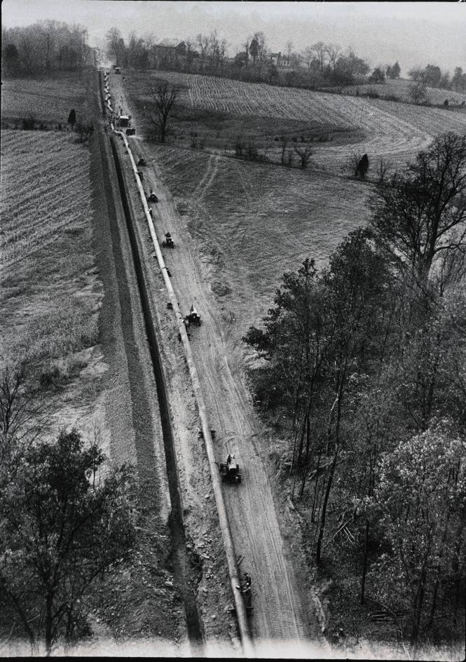 Aerial of Workers for Gulf Interstate Gas Co. Laying Pipeline for Natural Gas