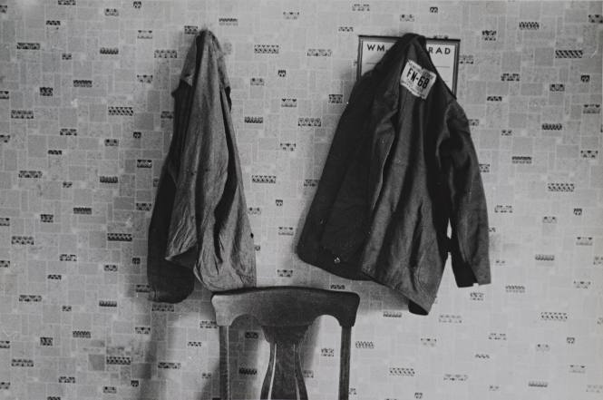 Clothes hanging in house at farmland auction, New Carlisle [i.e. Marysville], Ohio