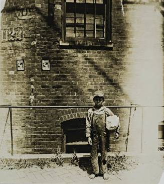 Untitled (Boy with bundle)
