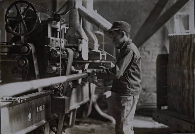 Indiana Mfg. Co., Boy Taking Boards Away from “Double Cut-Off Machine. “ A Suggestive Name!