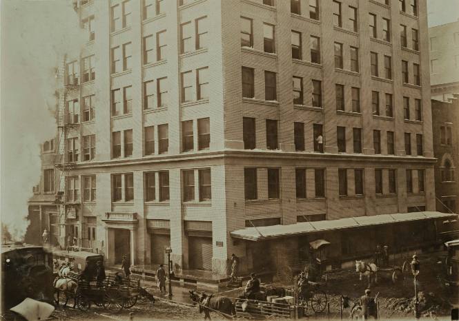 Untitled (Horse-drawn carts, steam, corner, window washer)
