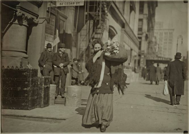 Untitled (Woman carrying bundle, Cedar Street, New York)