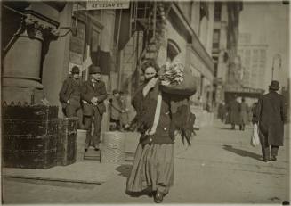 Untitled (Woman carrying bundle, Cedar Street, New York)