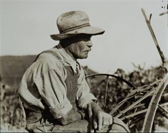 Untitled (Farmer with straw hat, seated)