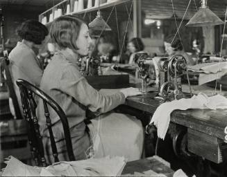 At Work in a Garment Factory, New York