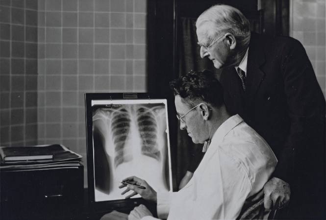 Untitled (Doctors examining chest x-ray)