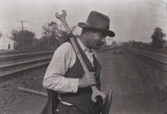 Untitled (Worker with wrench)