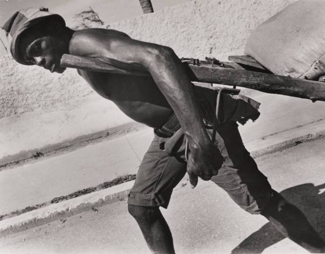 Untitled (Black man pulling cart)
