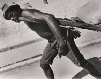 Untitled (Black man pulling cart)