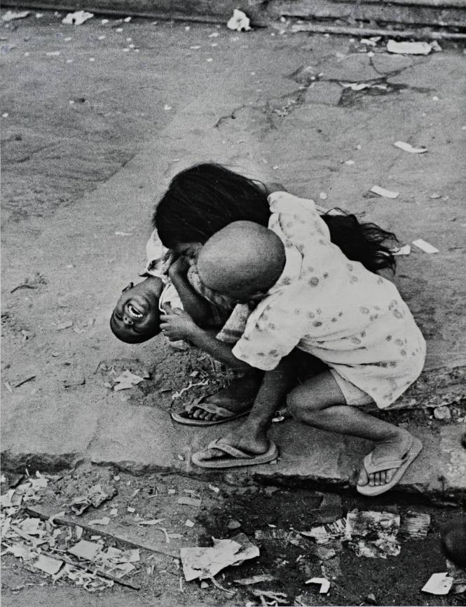 Untitled (Three children in thongs, playing)