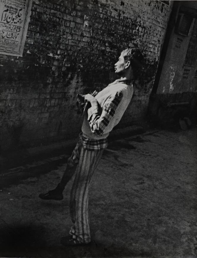 Untitled (Man with striped pants and plaid shirt)