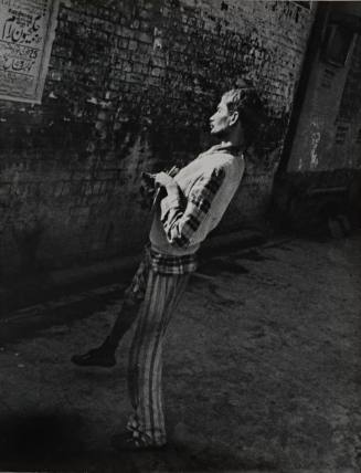Untitled (Man with striped pants and plaid shirt)