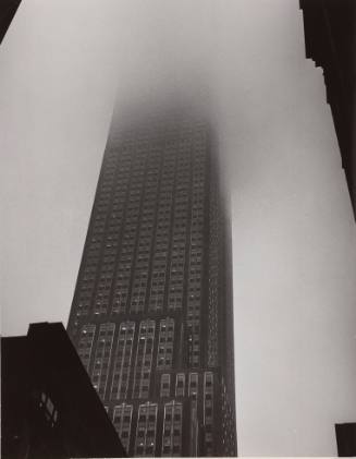 Empire State Building in Fog on a Rainy Day