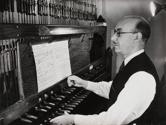 Kamiel Lefèvre playing the carillon clavier, Riverside Church, New York