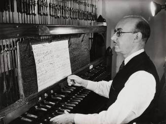 Kamiel Lefèvre playing the carillon clavier, Riverside Church, New York