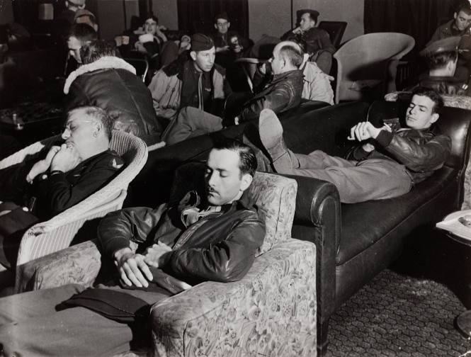 US bomber crews relaxing after early breakfast before taking off on raid