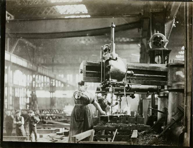 Women at battery drills, drilling angle and "T" bars for ribs of airship sheds