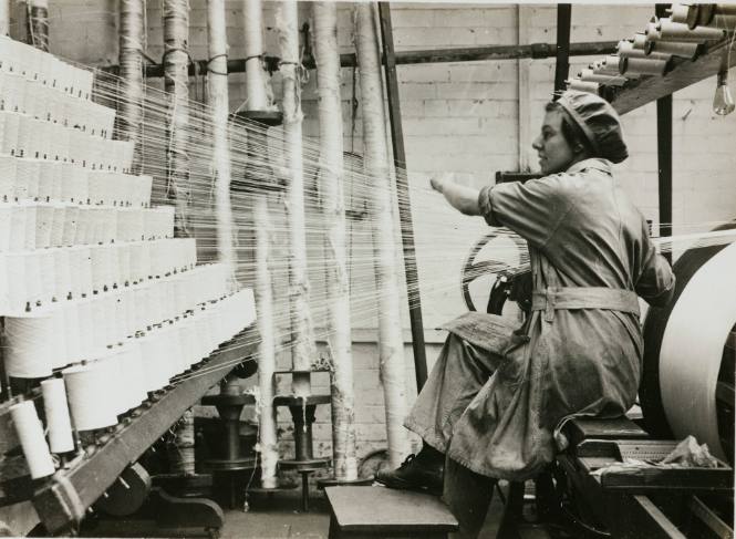 Women's Work: In lace factory in Nottingham (from the British Ministry of Information photographs of women working in factories during WWI)