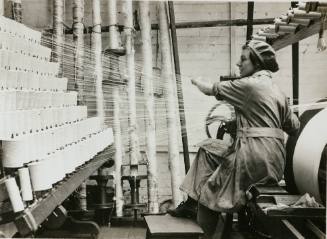 Women's Work: In lace factory in Nottingham (from the British Ministry of Information photographs of women working in factories during WWI)