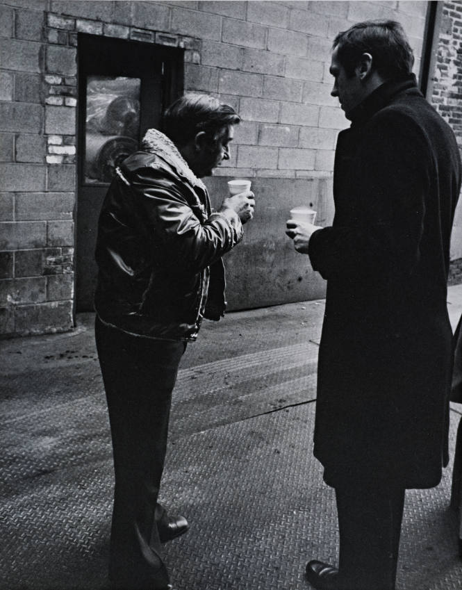 Two Men with Coffee Cups (Bill Bradley)