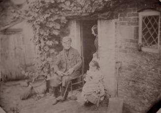 Family at Cottage Door