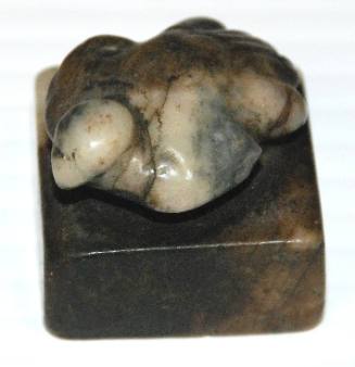 Jade square block chop seal, surmounted by a dove with spread wings and tail