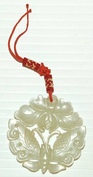 Jade pendant with a peony and butterfly design