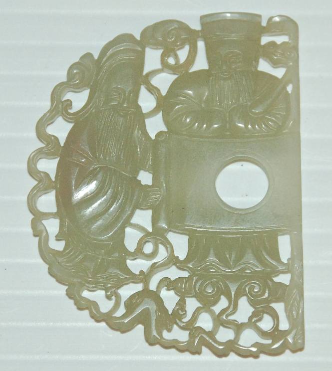One of a two-part belt buckle