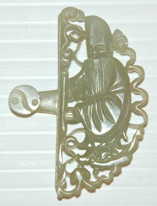 One of a two-part belt buckle