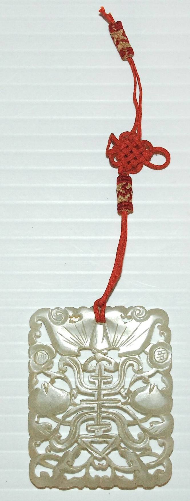 Jade pendant oblong form, open work character of Chu Lu Fu, two peaches a fungus spray, and a flying bat, symbol of longevity.