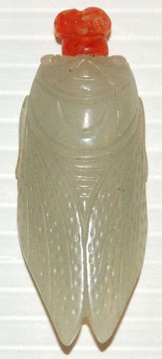 Jade cicada shaped snuff bottle with red carnelina stopper