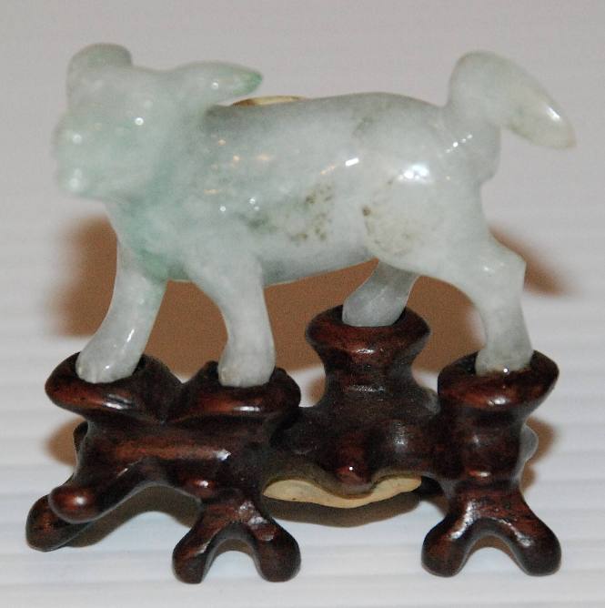 Jade statue of a dog with stand