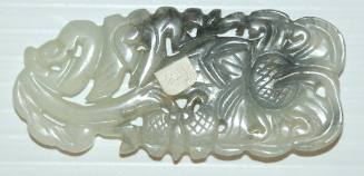 Medallion with melon, butterfly and flower motif