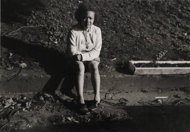 Woman Sitting on Curb (Millerton Portfolio)