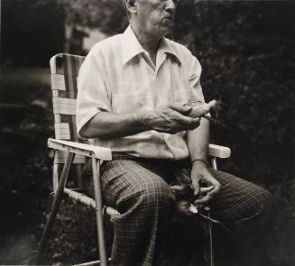 Man with Corn in Lawn Chair (Millerton Portfolio)