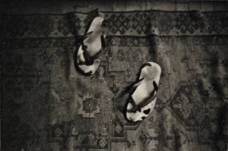 Thongs on Oriental Carpet