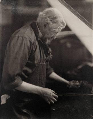 Joseph Pennell Wiping a Plate after Inking it