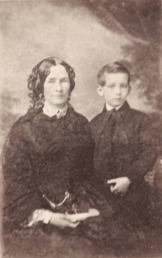 Unknown woman and young boy